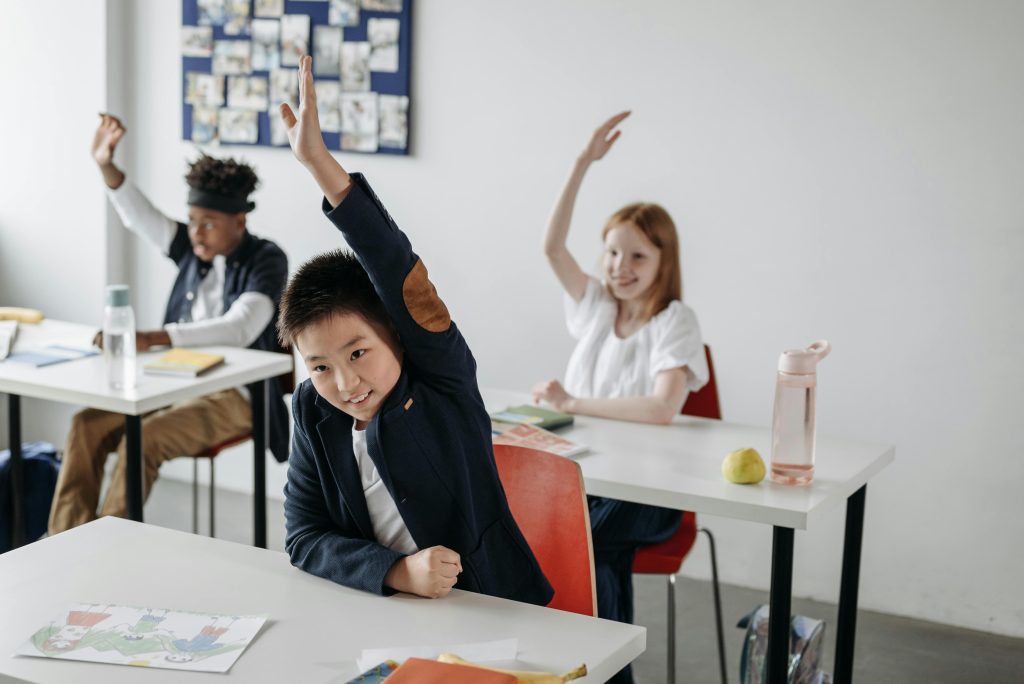 Children raising hands